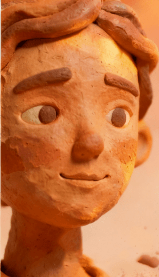 Clay figurine highlighting studio lighting effects